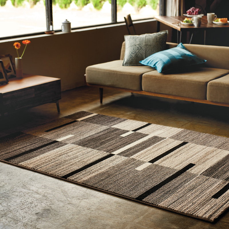 お部屋をおしゃれに演出してくれる柄入りラグマット - ソファー